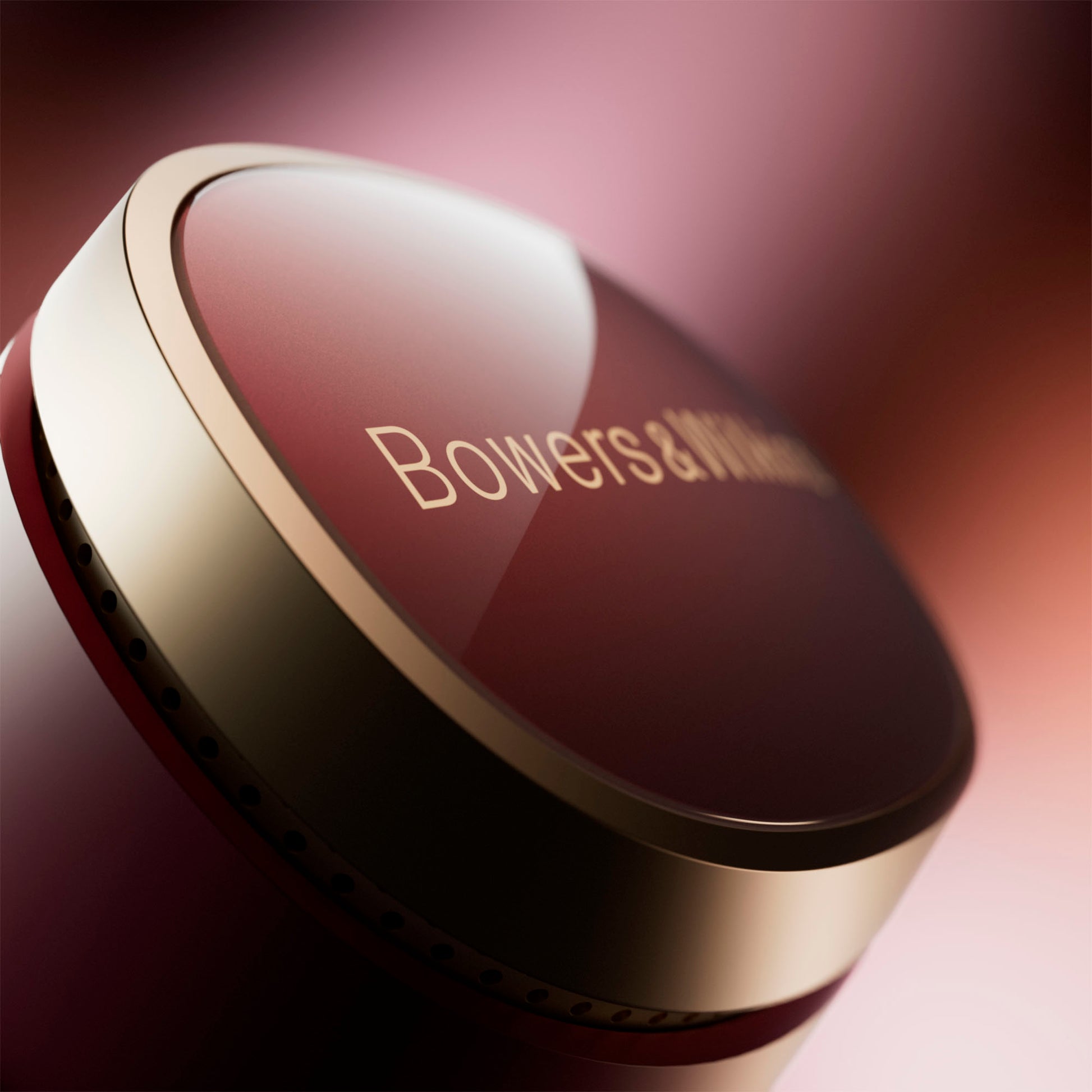 Close up of Bowers & Wilkins Pi8 Earbuds in Dark Burgundy