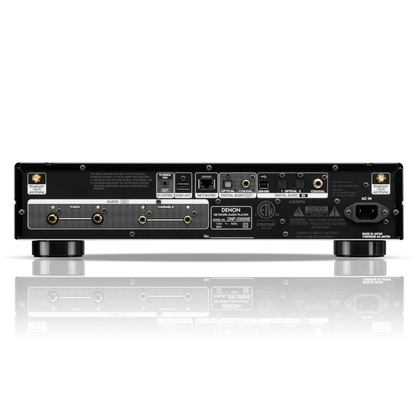 Back view of a Denon audio component on a white background