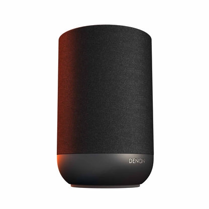 Angle view of black Denon Home 200 Speaker on white background