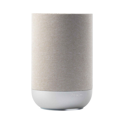 Angle view of white Denon Home 200 Speaker on white background