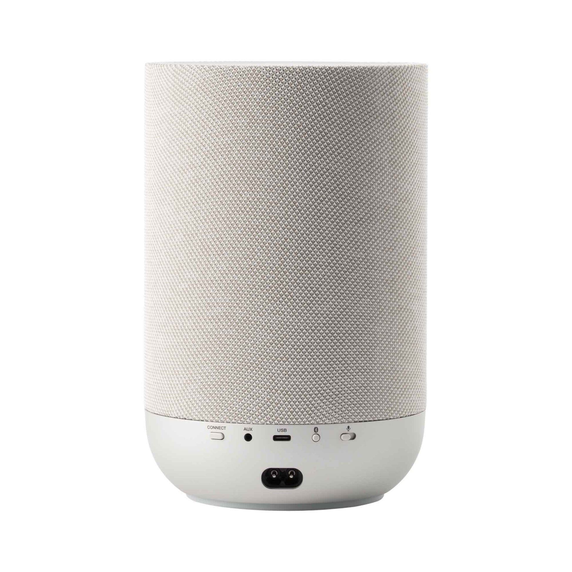 Back view of white Denon Home 200 Speaker on white background