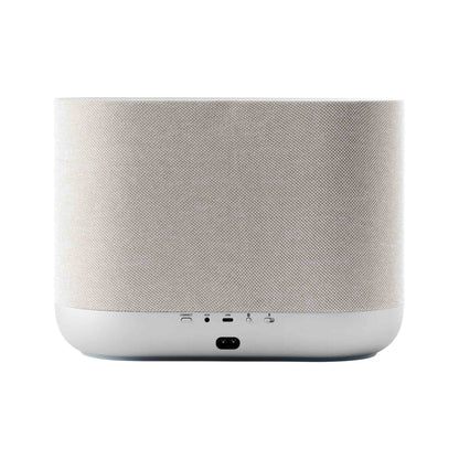 Back view of white Denon Home 400 wireless smart speaker on white background