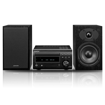 Denon audio system with two speakers on a white background