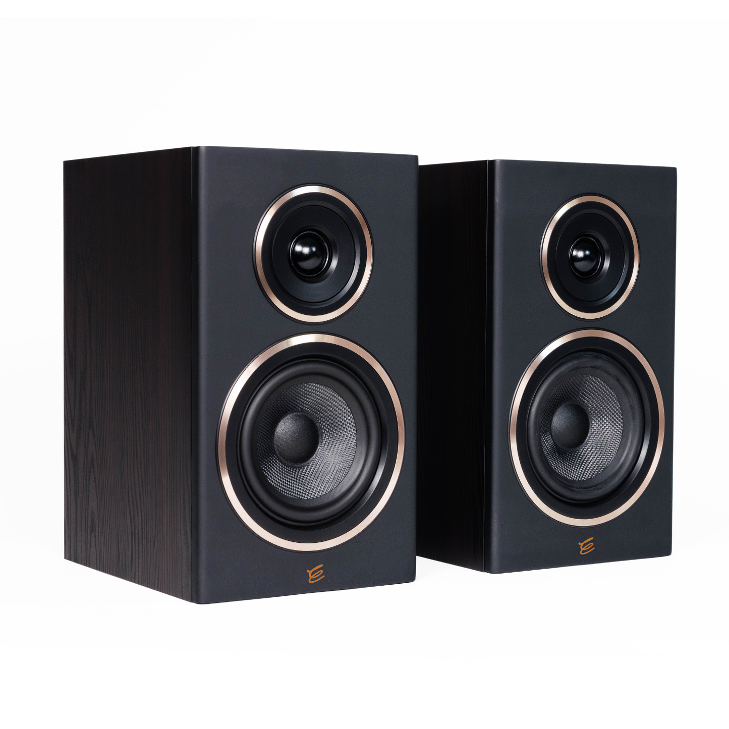 A pair of black bookshelf speakers with wood-grain fronts, circular drivers, and metallic gold trim, shown against a plain white background.