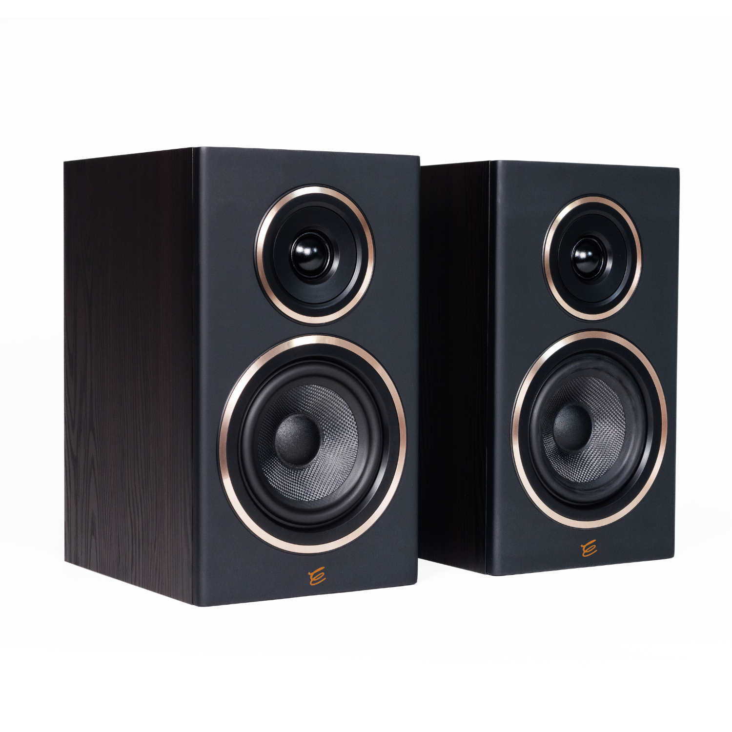A pair of black bookshelf speakers with wood-grain fronts, circular drivers, and metallic gold trim, shown against a plain white background.