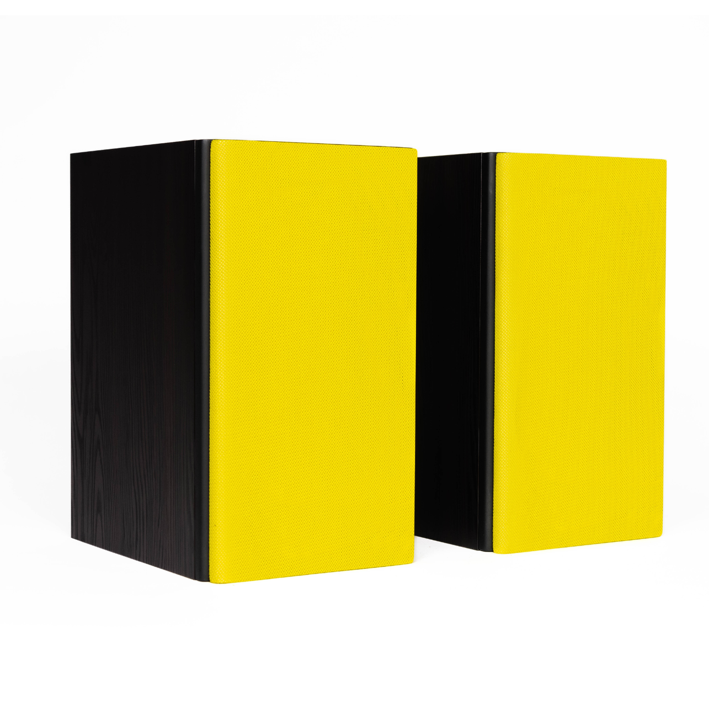 Two bookshelf speakers standing upright on a white background, each featuring a bright yellow front panel and a black side panel.