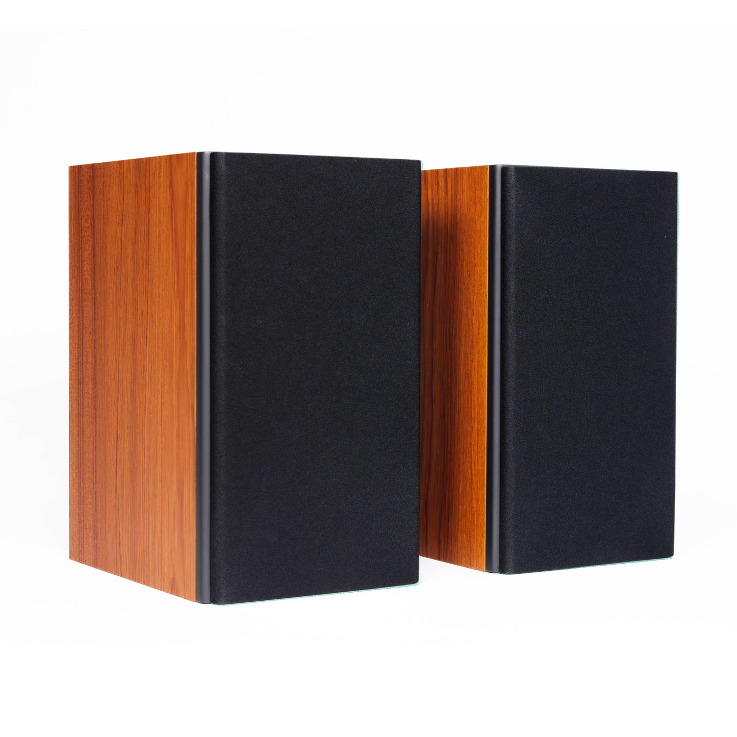 Two bookshelf speakers with black fabric front panels and warm brown wood-grain side panels, shown on a clean white background.