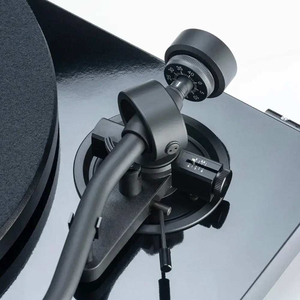 Close-up of a turntable on a white background