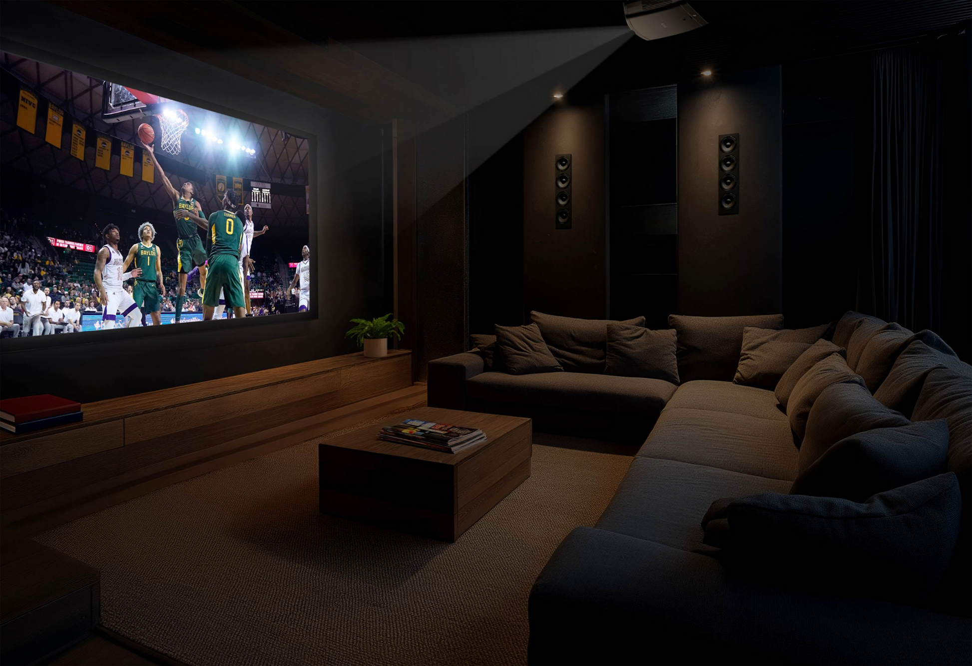 Home theater setup with a large screen displaying a basketball game, surrounded by comfortable seating and dim lighting.