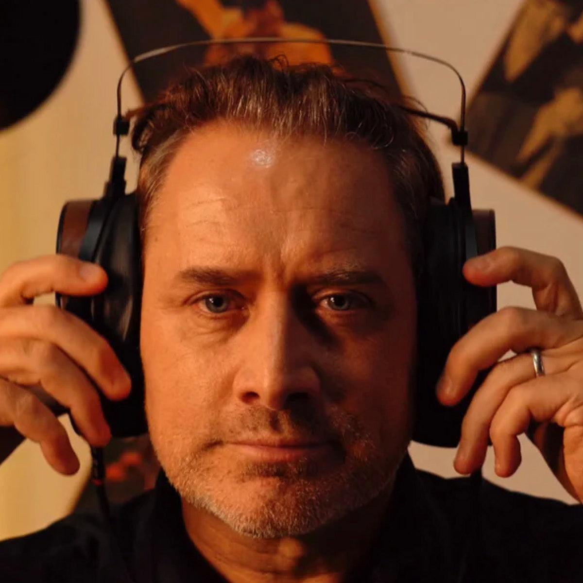 Man wearing Fosi Audio i5 Planar Magnetic Headphones