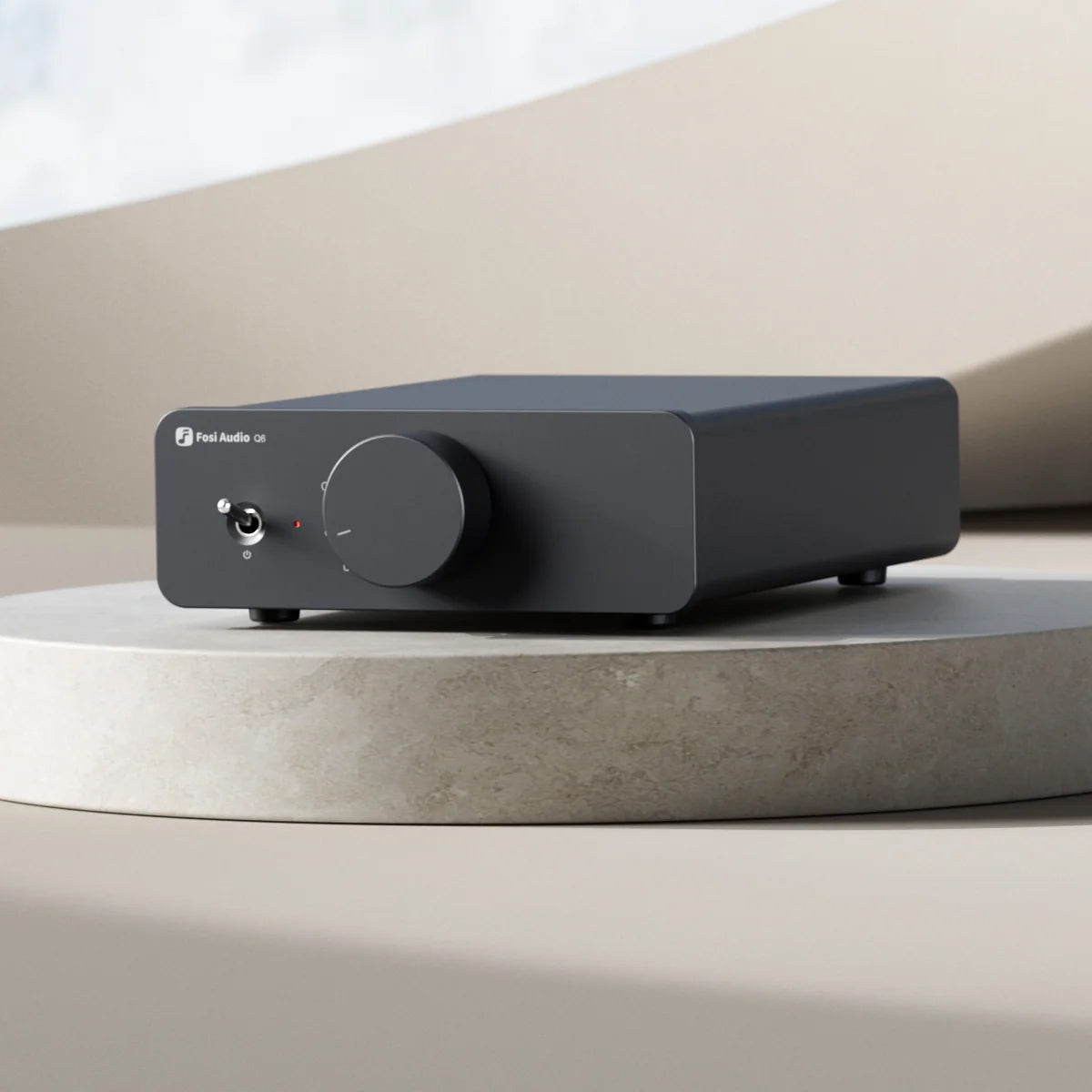 Fosi Audio Q6 Desktop DAC on stone bench