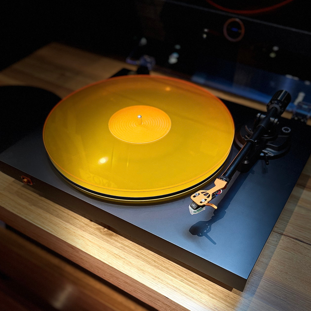 Fosi Audio Luna3 Turntable sitting on timber shelf