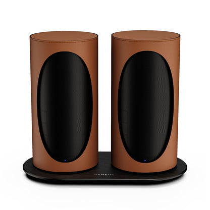 Pair of Geneva Duo Speakers in Cognac on charging cradle