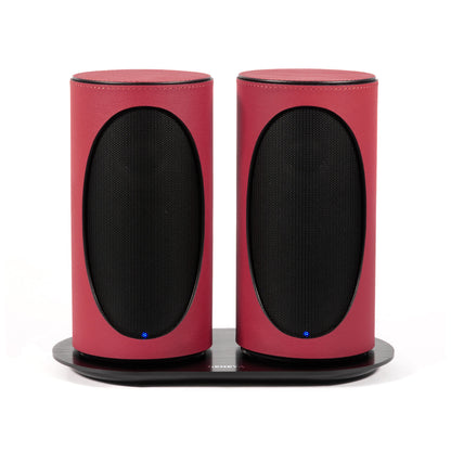 Pair of Geneva Duo Speakers in Red on charging cradle