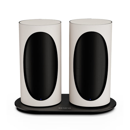 Pair of Geneva Duo Speakers in White on charging cradle