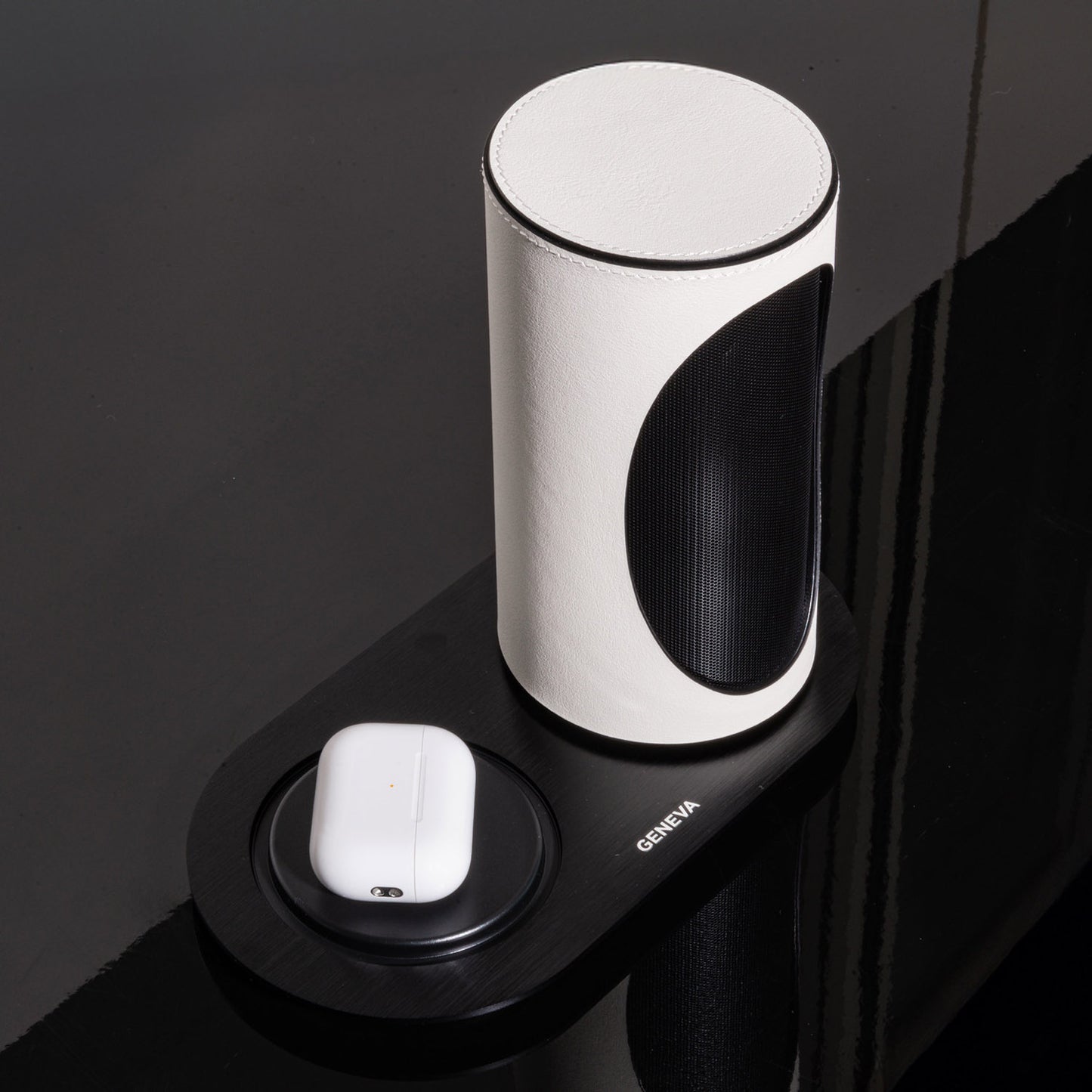 Geneva Duo Speaker in white on charging cradle