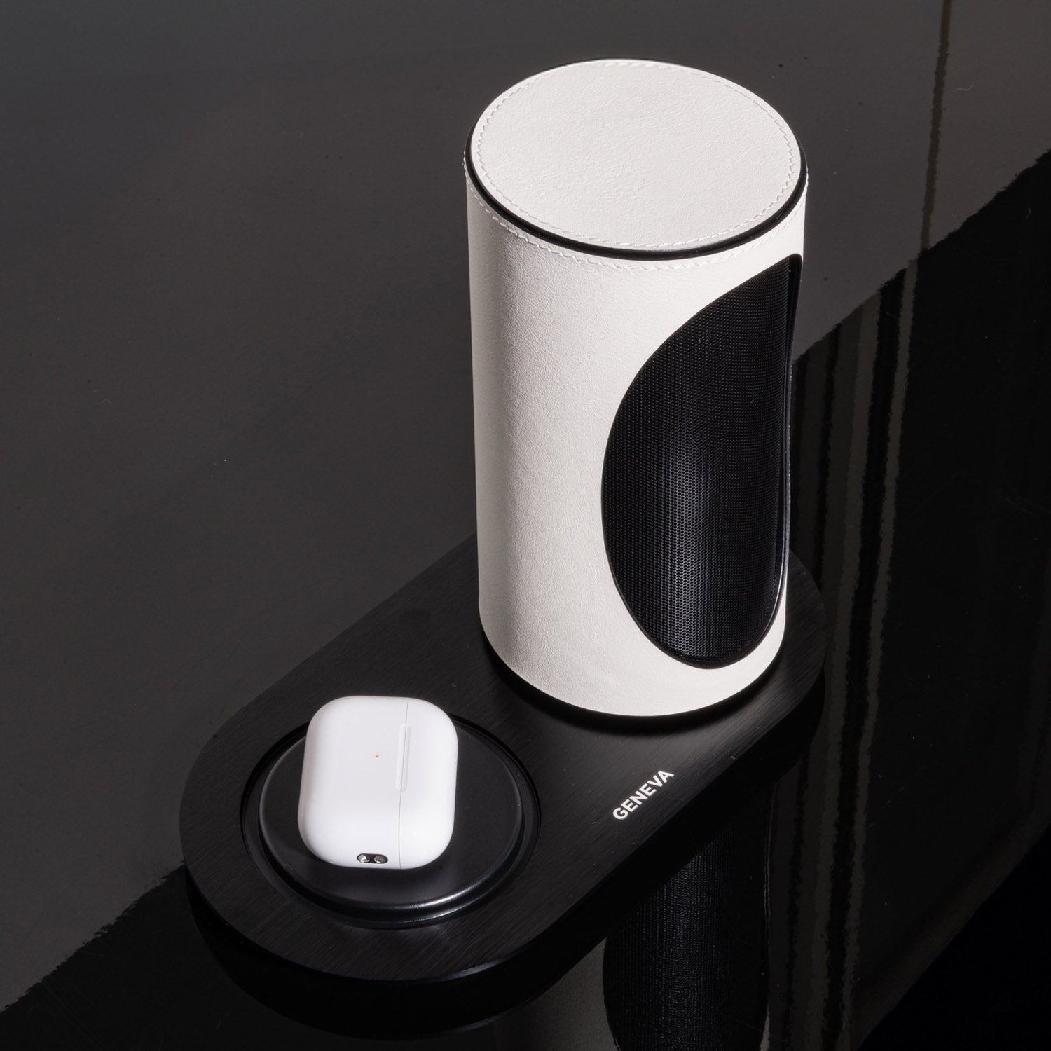 Geneva Duo Speaker in white on charging cradle