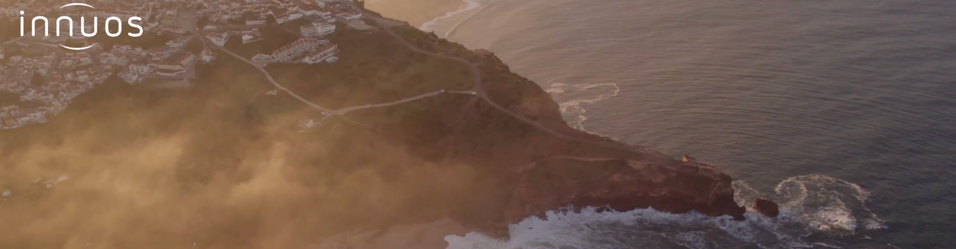 innuos logo on cliff with ocean 