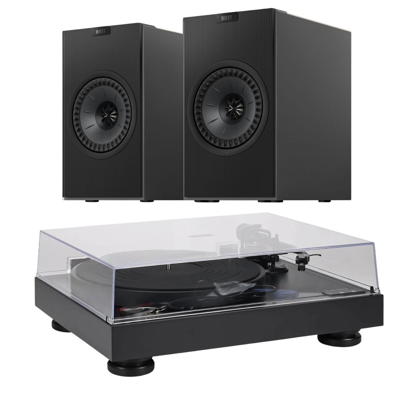 Pair of black speakers and a turntable with clear cover on a white background