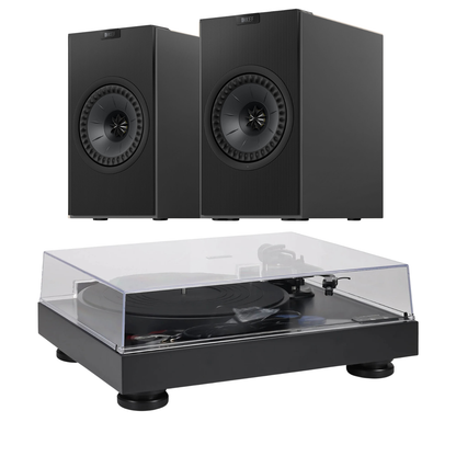 Pair of black speakers and a turntable with clear cover on a white background