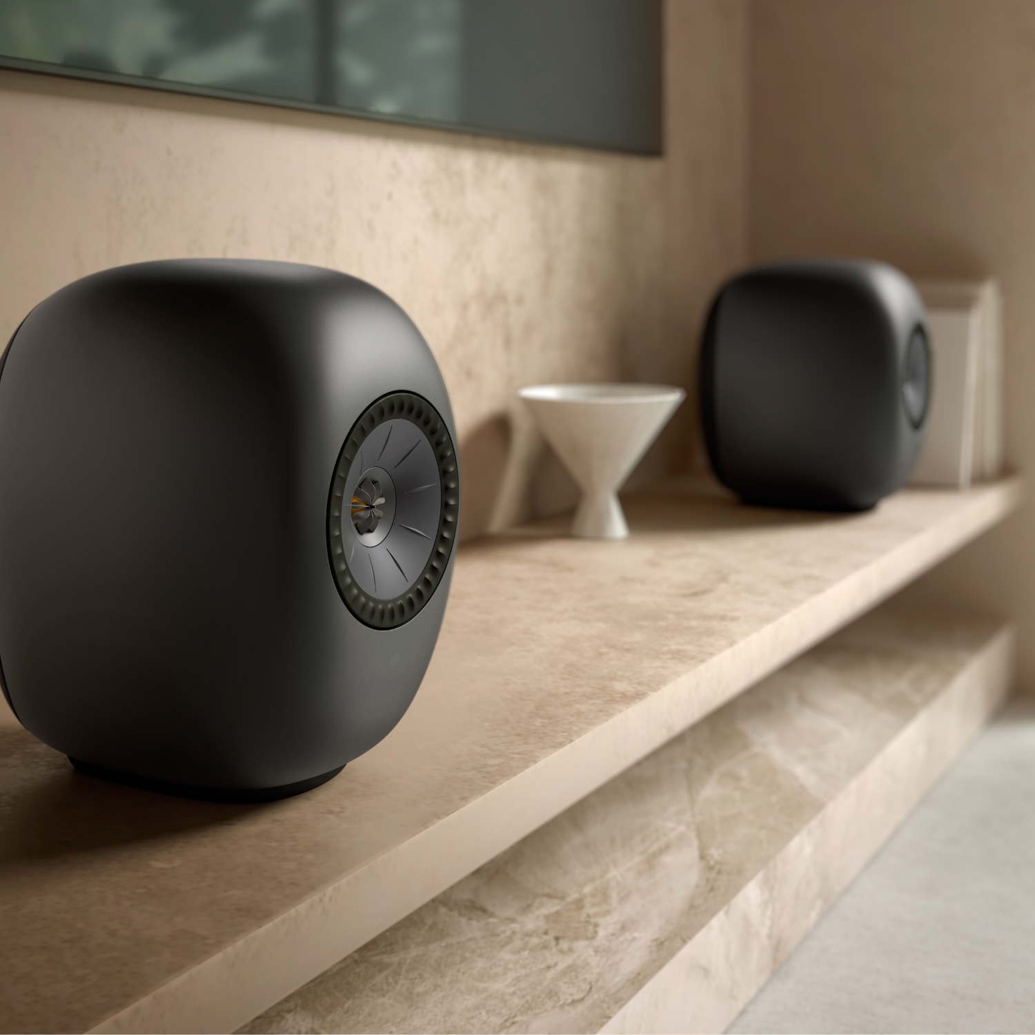 KEF LS LUXE Wireless Powered Speakers in Eclipse Black finish on white background
