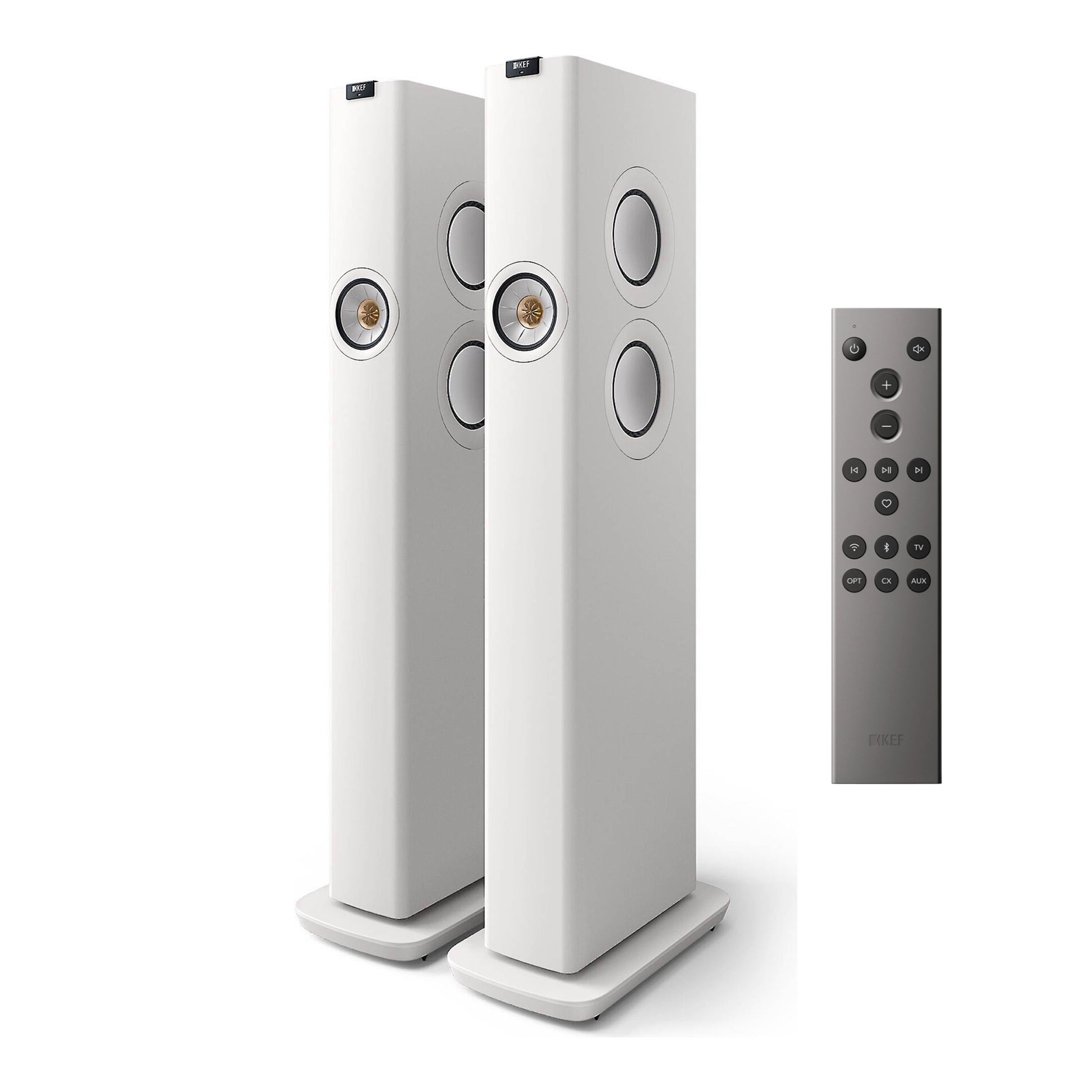 White floor-standing speakers with a remote control on a white background