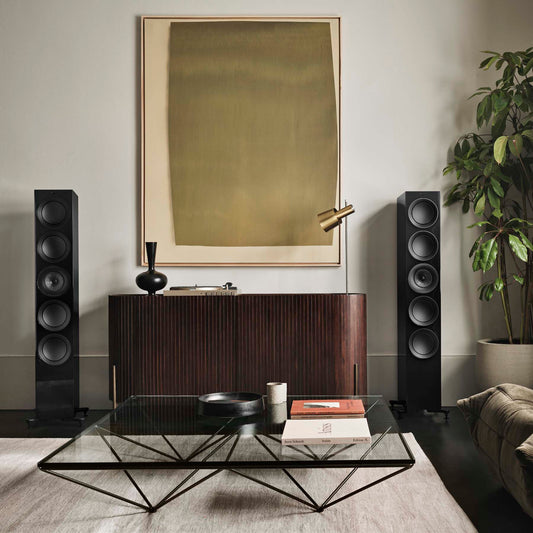 A pair of KEF R11 Meta floorstanding speakers in black in living room