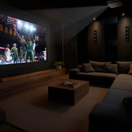 Home theater setup with a large screen displaying a basketball game, surrounded by comfortable seating and decor.