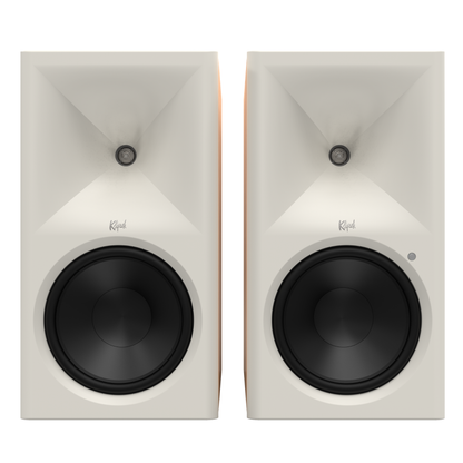 Pair of Klipsch The Nines II Powered Speakers in red oak on white background