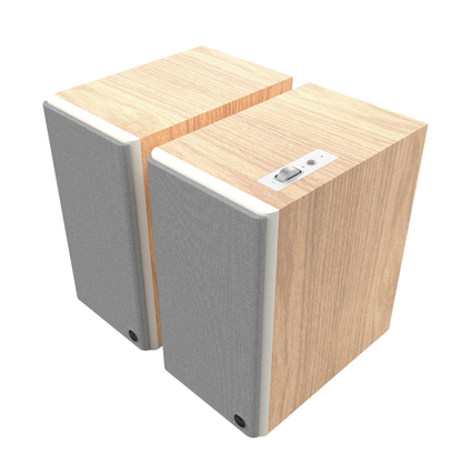 Front angle of red oak Klipsch The Sevens II Powered Speakers on white background