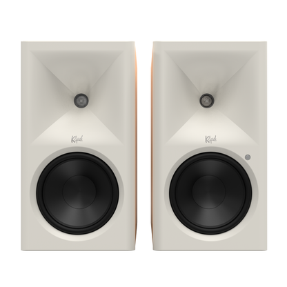 Front view of red oak Klipsch The Sevens II Powered Speakers on white background
