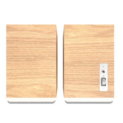 Top view of red oak Klipsch The Sevens II Powered Speakers on white background