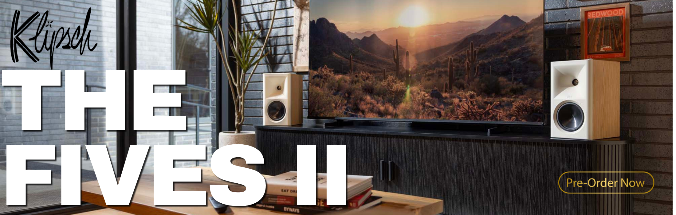 Advertisement for Klipsch speakers with a scenic background and text 'The Fives II'.