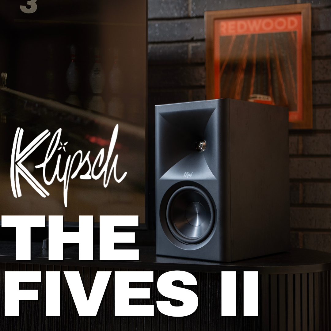 Klipsch speaker with 'The Fives II' text and 'Redwood' poster in the background