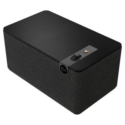 Top angle view of black Klipsch The Three Plus Bluetooth Speaker on white background