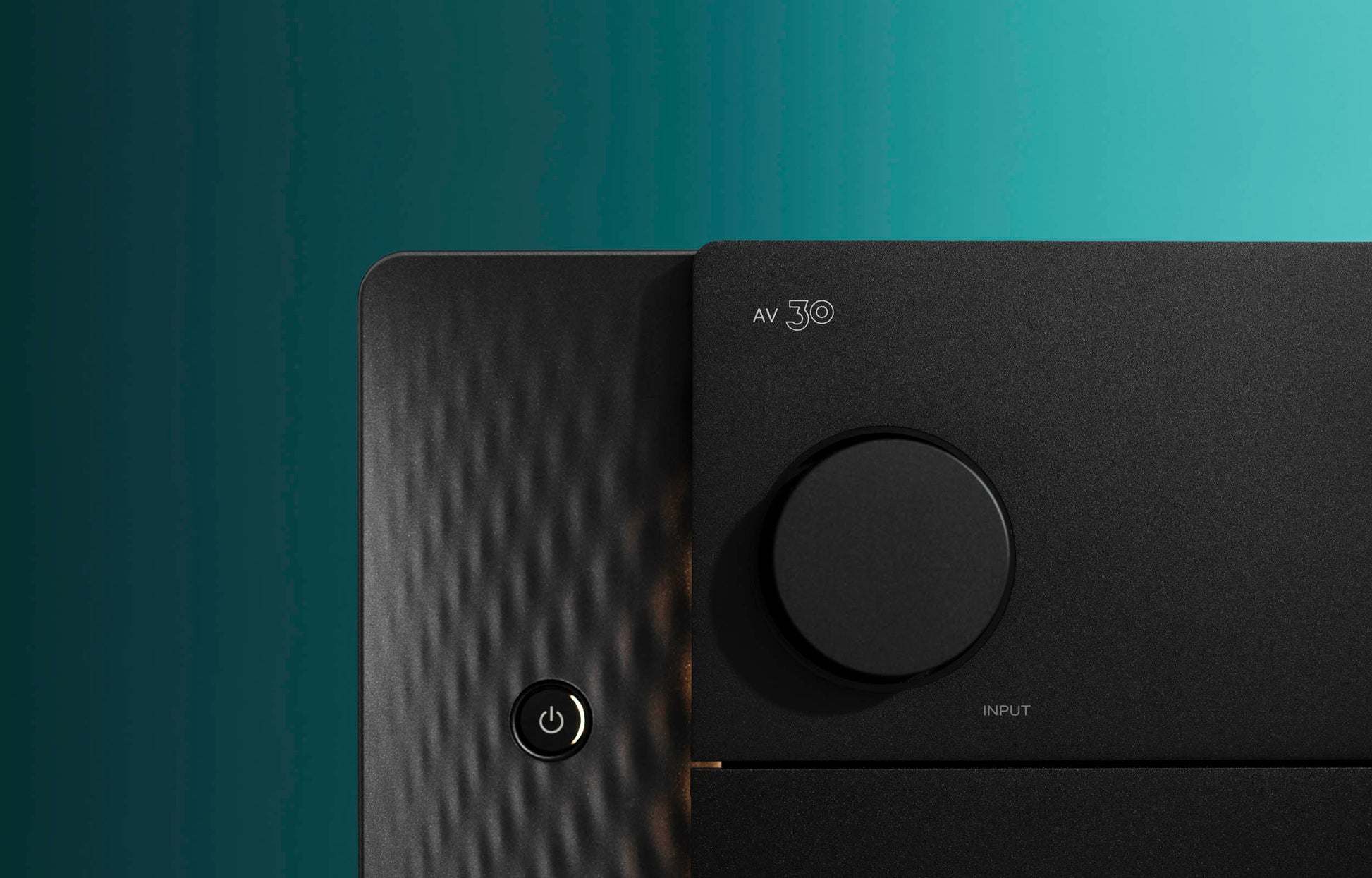 Black Marantz AV30 with control buttons on a teal background