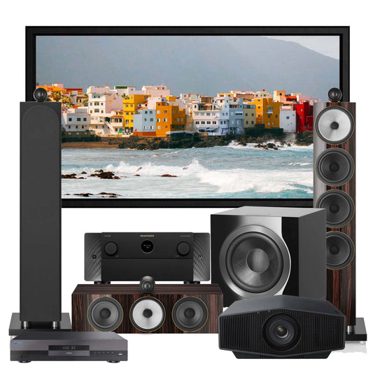 Home theater system with screeb displaying a coastal scene, surrounded by speakers and audio components.