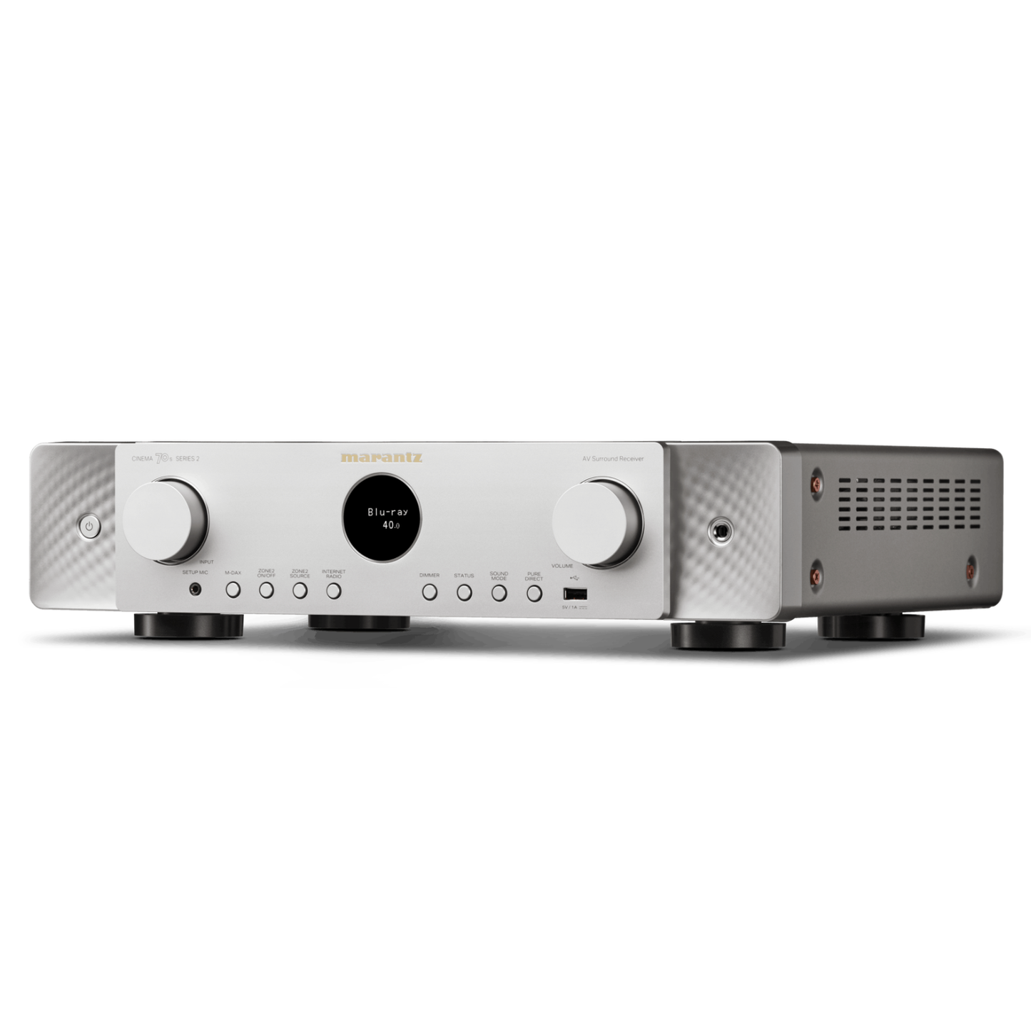 A silver Marantz AV receiver amplifier with a digital display screen in the center, flanked by two volume knobs, set against a plain white background.
