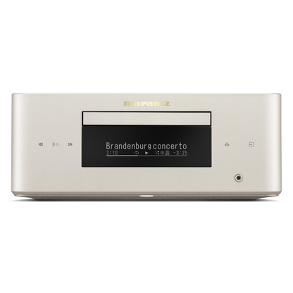 A Marantz CD player in a warm champagne-gold finish, featuring a black display screen