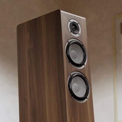 Matte Walnut Marten Oscar Trio Floorstanding Speakers with blurred background