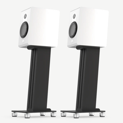 Pair of white Marten Parker Duo Bookshelf Speakers on black stands against a white background