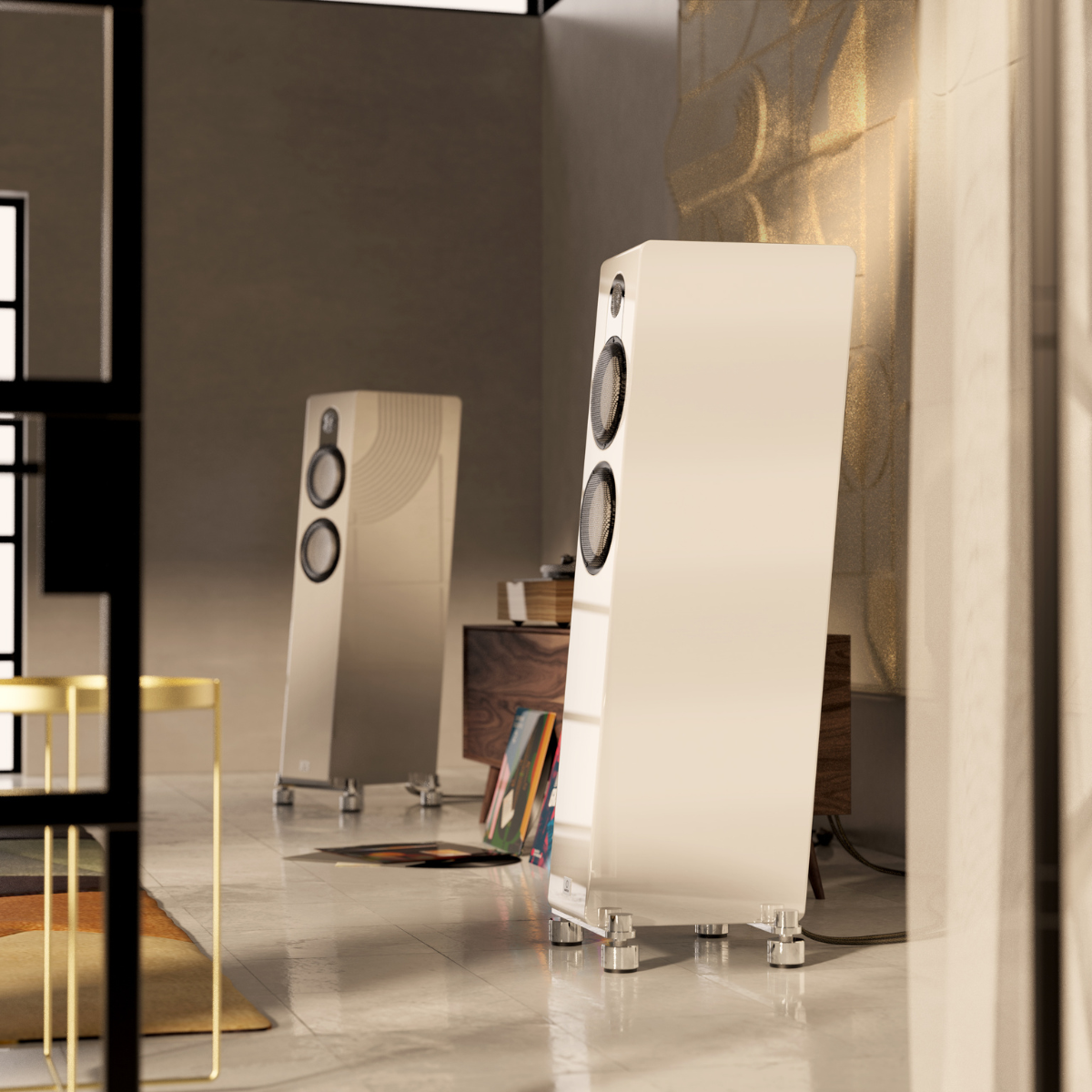 Two white floor-standing speakers in a room with a mirror and decorative elements.