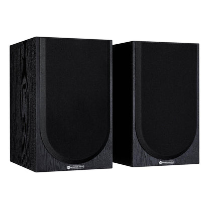Pair of black speakers on a white background