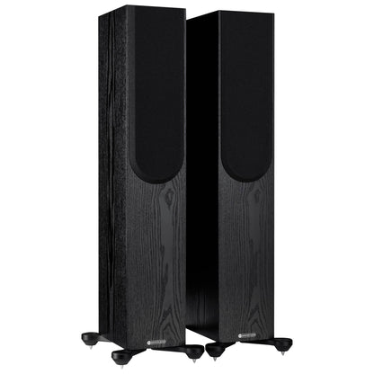 Pair of black speakers on a white background