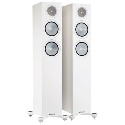 Pair of white floor-standing speakers on a white background