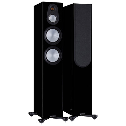 Pair of black floor-standing speakers on a white background