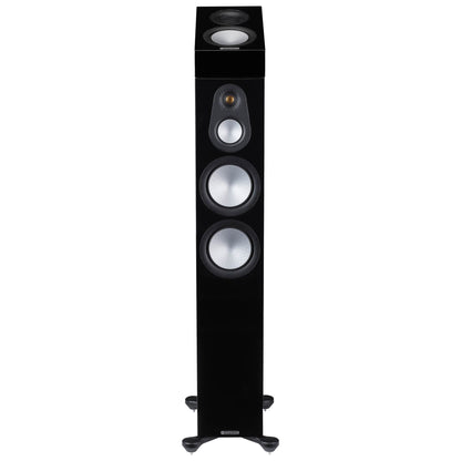 Black floor-standing speaker on a white background