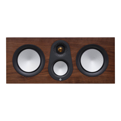Three-way speaker system with wooden front panel on a white background