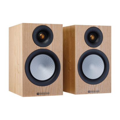 Pair of wooden speakers on a white background