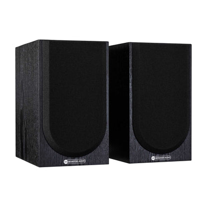 Pair of black speakers on a white background